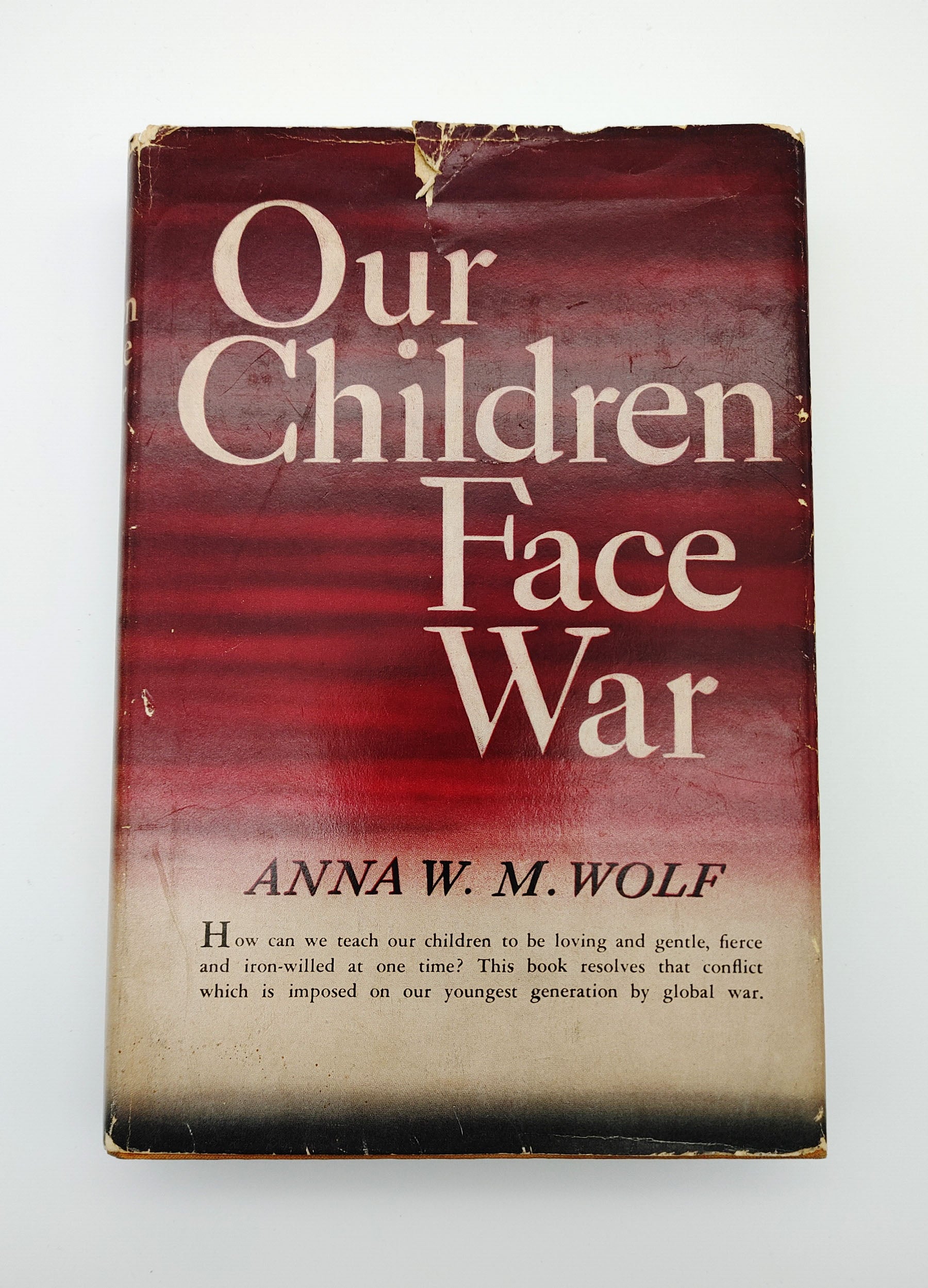 dust jacket of the first edition of Wolf's Our Children Face War (1942)