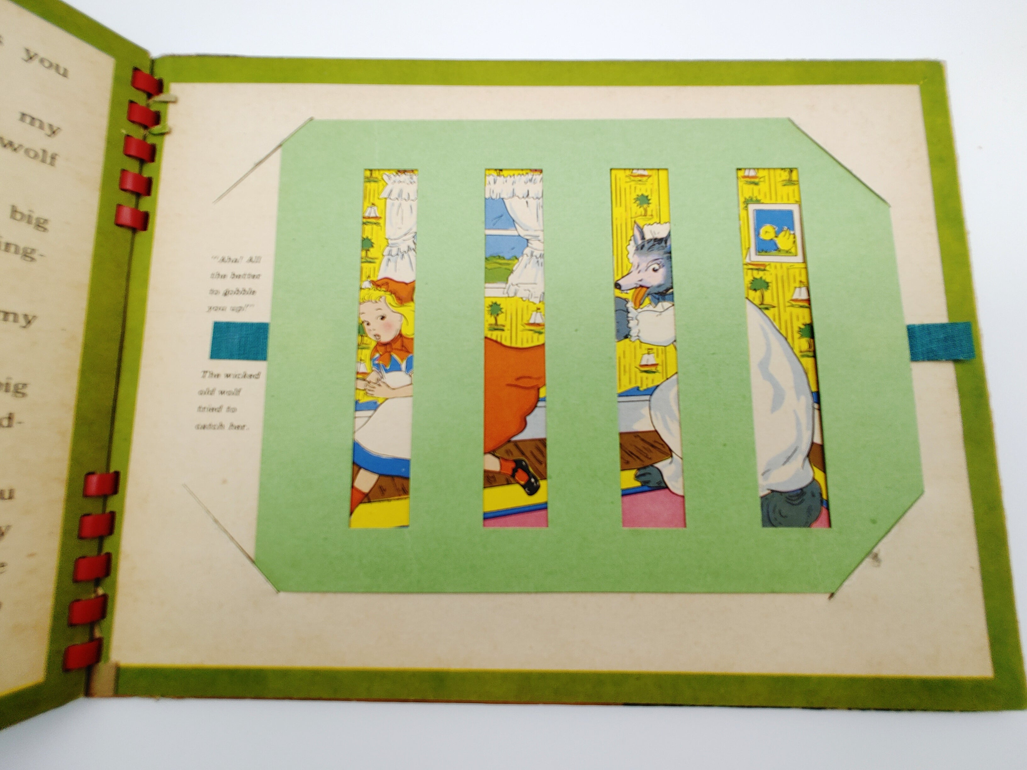 Slat moveable of Red Riding Hood and the wolf from Little Red Riding Hood (1943)